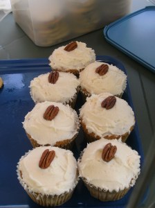 Carrot Cake Muffins with a Pecan in the middle for decoration